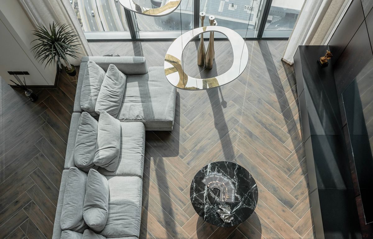 Visualisation of a living room with a sculptural staircase